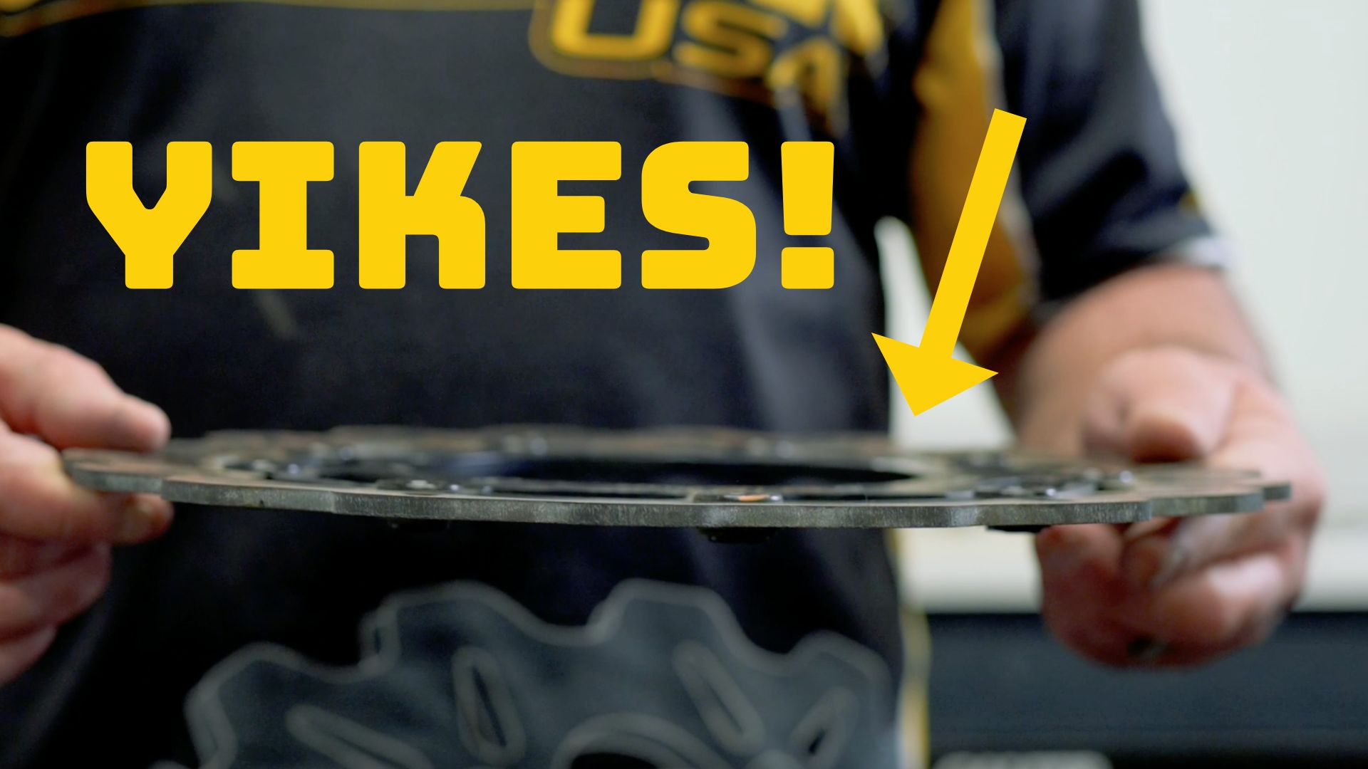 A dished motorcycle brake rotor